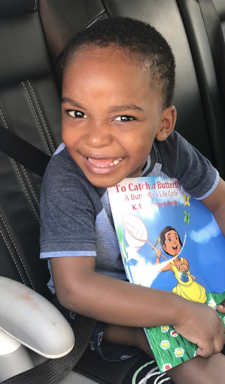 Boy holding book